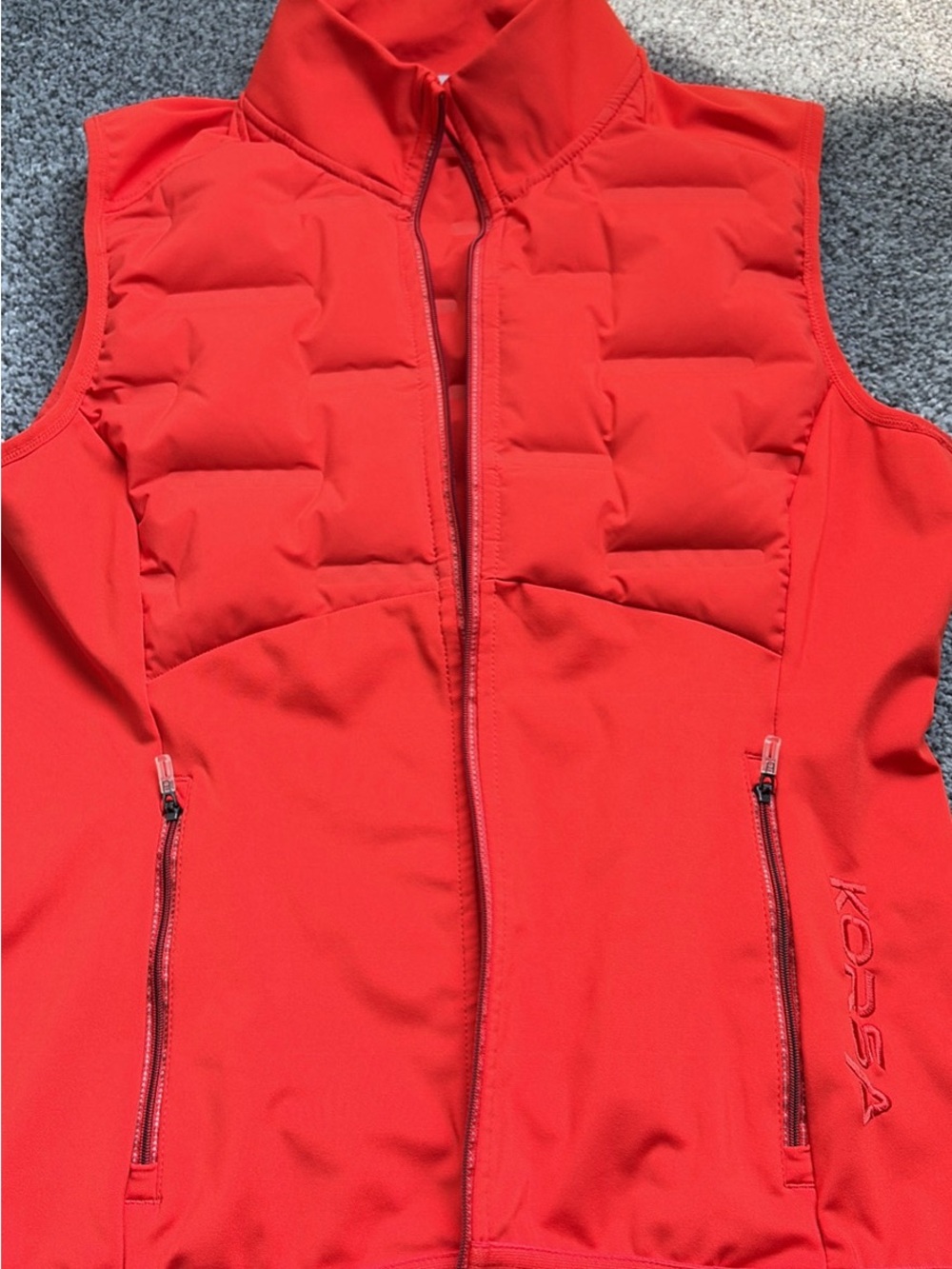 Orange puffy running/active Vest